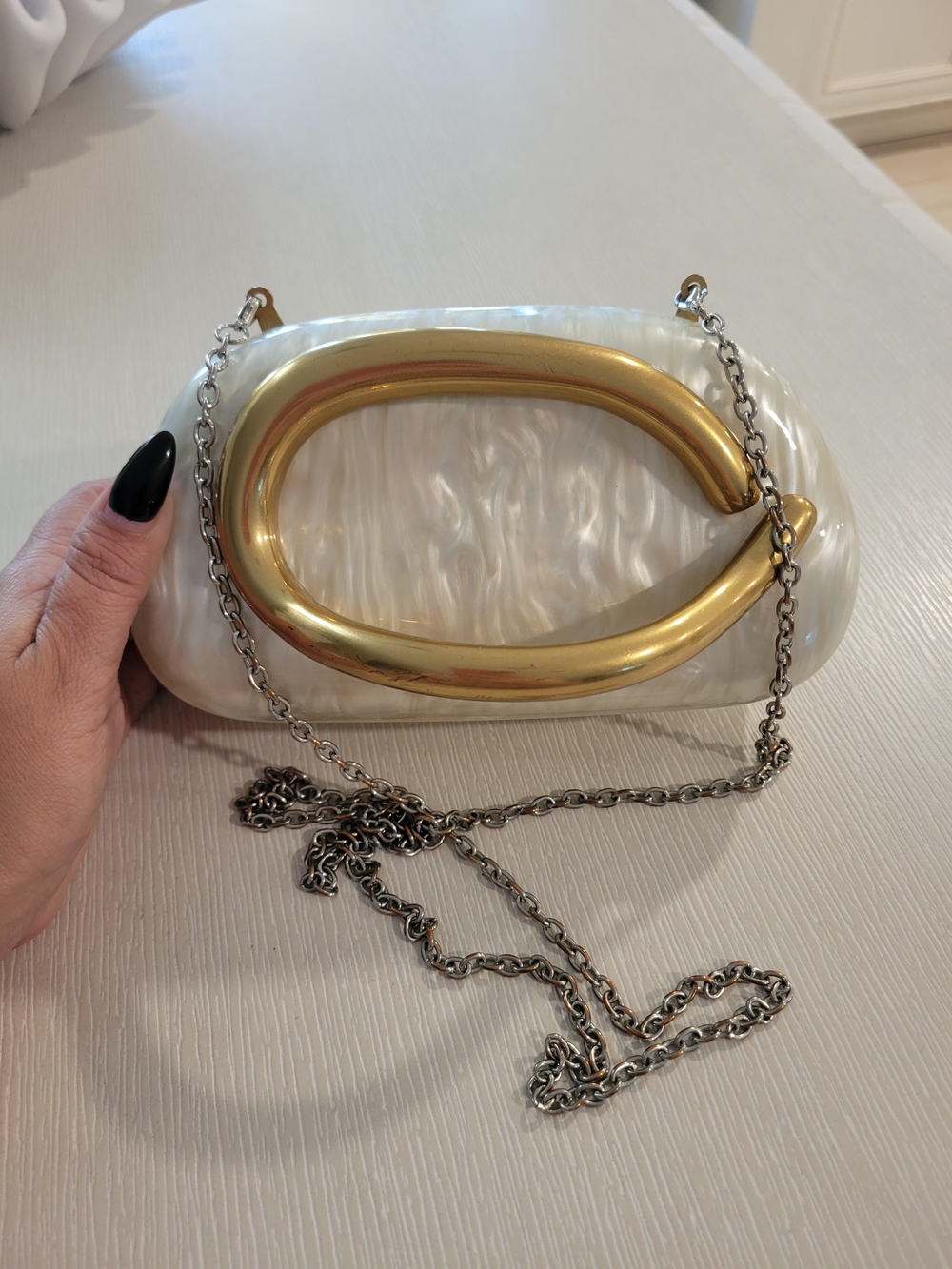 Pearlescent White Resin Clutch with Gold Accent Chain Strap